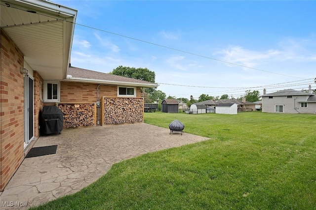 7278 Barton Hill Dr, Parma, OH 44129 - view of green lawn with a patio