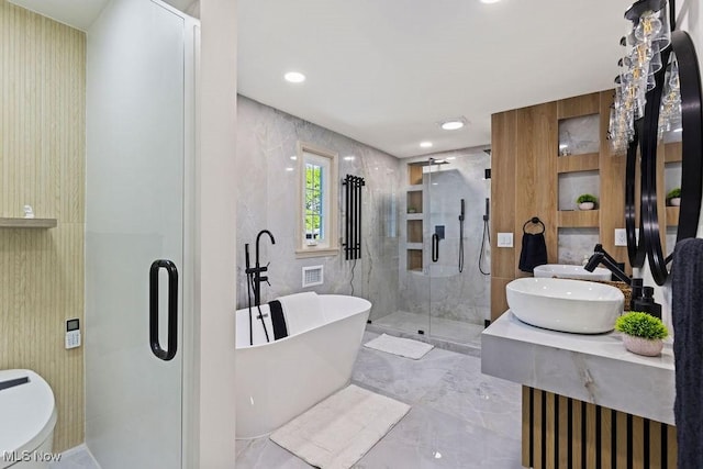 21262 S Woodland Rd, Shaker Heights, OH 44122 - full bath featuring a stall shower, a soaking tub, marble tiled flooring, and double vanity