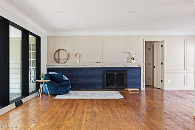 21262 S Woodland Rd, Shaker Heights, OH 44122 - unfurnished room with a fireplace and wood finished floors