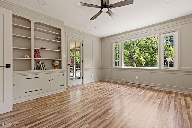 21262 S Woodland Rd, Shaker Heights, OH 44122 - spare room featuring a decorative wall, ceiling fan, and light wood-style floors