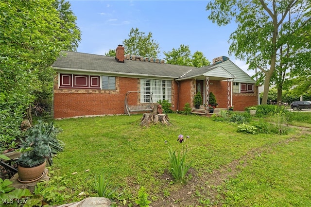 6123 Wilson Mills Rd, Highland Heights, OH 44143 - single story home with a chimney, a front lawn, and brick siding
