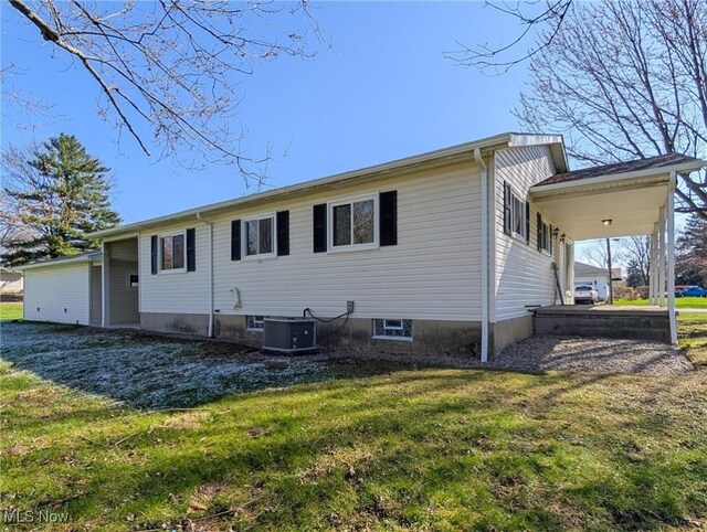 3509 Jerrold Blvd, Brunswick, OH 44212 - rear view of house featuring a lawn and cooling unit
