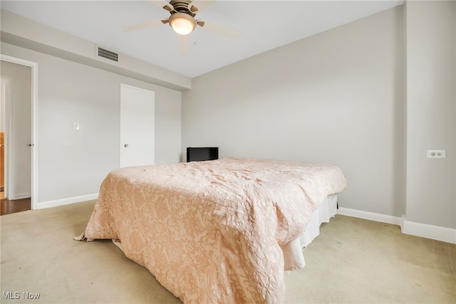 13800 Fairhill Rd Unit 418, Shaker Heights, OH 44120 - bedroom featuring light colored carpet, baseboards, and ceiling fan