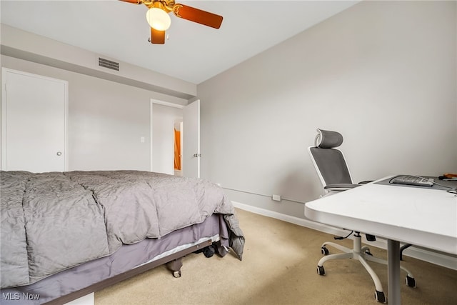 13800 Fairhill Rd Unit 418, Shaker Heights, OH 44120 - carpeted bedroom featuring a desk, baseboards, and a ceiling fan