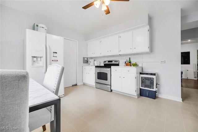 13800 Fairhill Rd Unit 418, Shaker Heights, OH 44120 - kitchen with stainless steel electric range oven, white fridge with ice dispenser, a ceiling fan, heating unit, and white cabinets