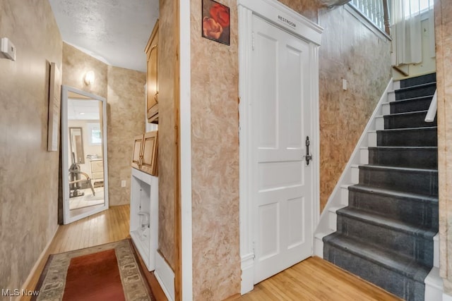 7285 Center St, Mentor, OH 44060 - stairs featuring wood finished floors