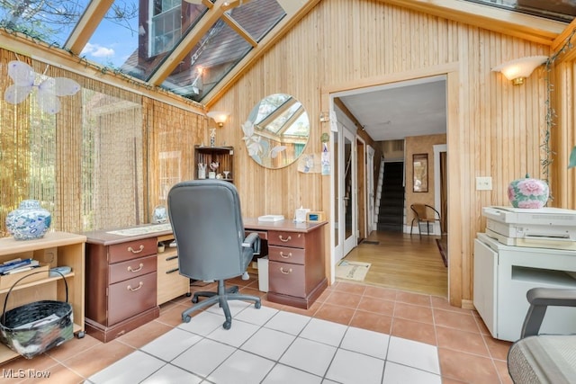 7285 Center St, Mentor, OH 44060 - home office featuring light tile patterned flooring and wooden walls
