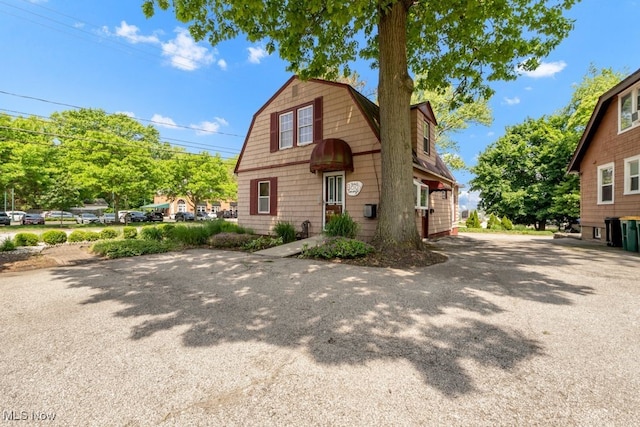 7285 Center St, Mentor, OH 44060 - dutch colonial with a gambrel roof