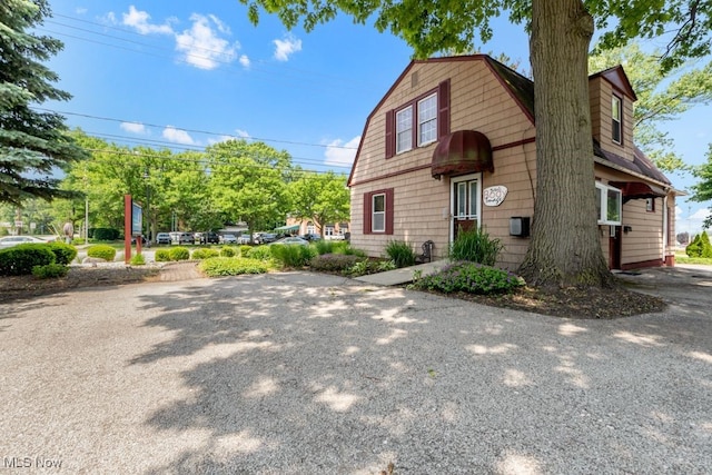 7285 Center St, Mentor, OH 44060 - dutch colonial featuring a gambrel roof