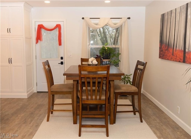 646 Ridgewood Dr, Coshocton, OH 43812 - dining space featuring light wood-style floors, baseboards, and recessed lighting