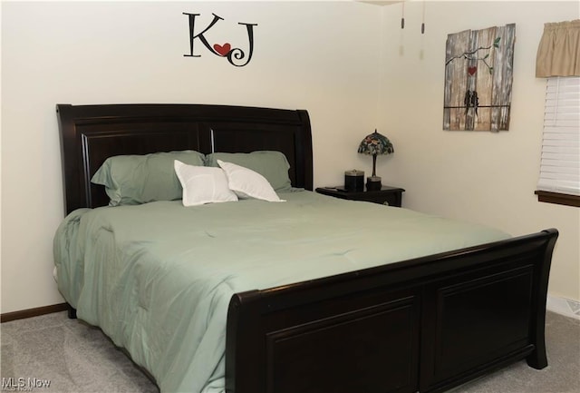 646 Ridgewood Dr, Coshocton, OH 43812 - bedroom featuring light colored carpet and baseboards