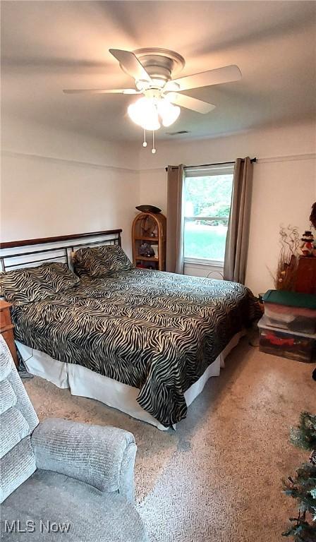 550 E Pleasant Valley Rd, Seven Hills, OH 44131 - carpeted bedroom featuring a ceiling fan