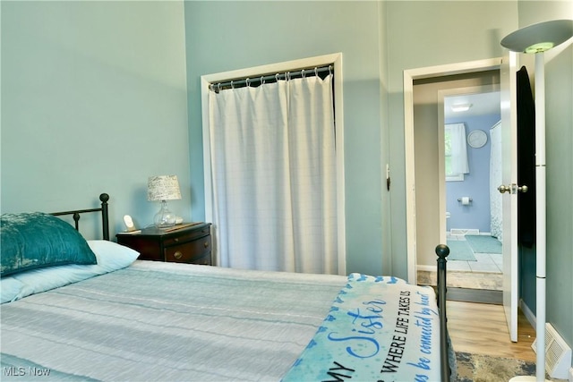 377 Henn Hyde Rd NE, Warren, OH 44484 - bedroom featuring wood finished floors and baseboards