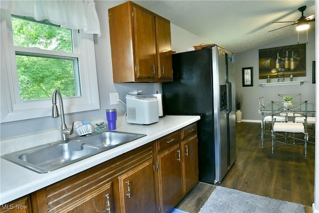 377 Henn Hyde Rd NE, Warren, OH 44484 - kitchen with a sink, dark wood-style flooring, light countertops, ceiling fan, and vaulted ceiling