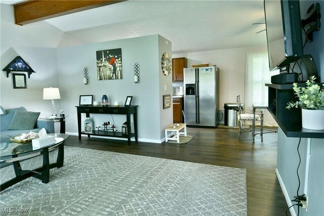 377 Henn Hyde Rd NE, Warren, OH 44484 - living area featuring dark wood-style flooring, baseboards, and beamed ceiling