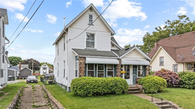 917 Park Ave SW, Canton, OH 44706 - view of front of home with a front yard