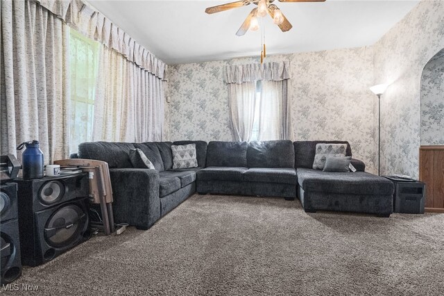 917 Park Ave SW, Canton, OH 44706 - living room featuring wallpapered walls, carpet flooring, and ceiling fan