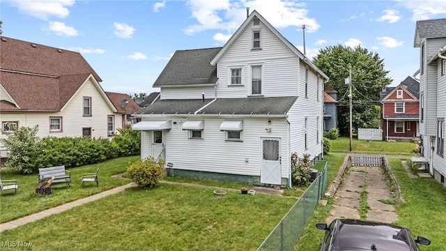 917 Park Ave SW, Canton, OH 44706 - back of property featuring a shingled roof