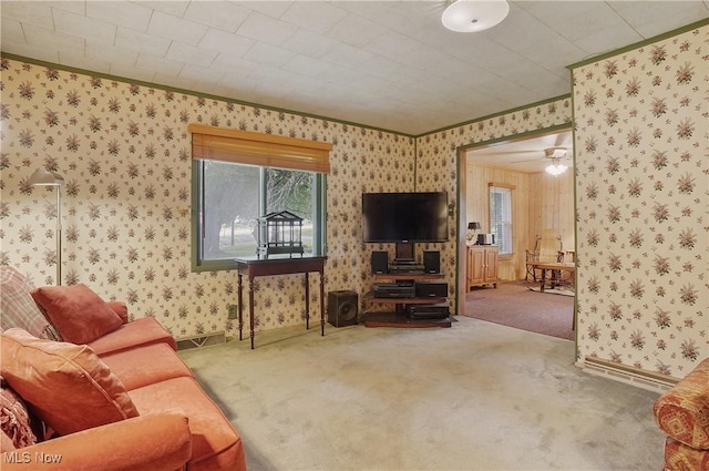 890 E Liberty St, Hubbard, OH 44425 - carpeted living room with crown molding, wallpapered walls, and baseboards