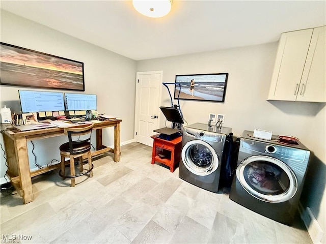6911 Post Ln, Hudson, OH 44236 - laundry room featuring washer and clothes dryer, cabinet space, a desk, and baseboards