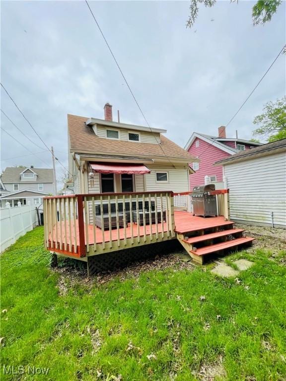 1630 Olivewood Ave, Lakewood, OH 44107 - rear view of property featuring a wooden deck and a chimney
