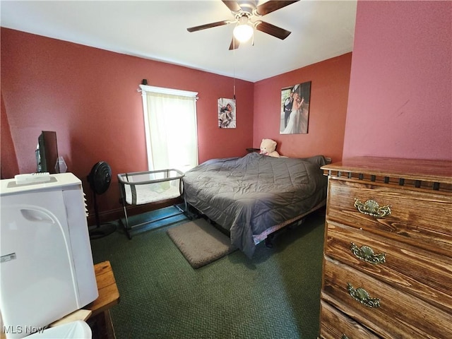 815 Denman Ave, Coshocton, OH 43812 - carpeted bedroom featuring a ceiling fan