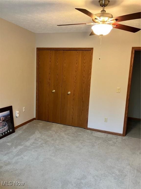 19510 Lorain Rd, Fairview Park, OH 44126 - unfurnished bedroom with a closet, carpet flooring, baseboards, and a ceiling fan