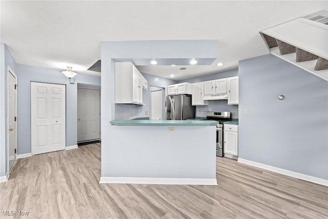 6465 Saint Andrews Dr Unit 6, Canfield, OH 44406 - kitchen featuring stainless steel appliances, white cabinets, light wood finished floors, and baseboards