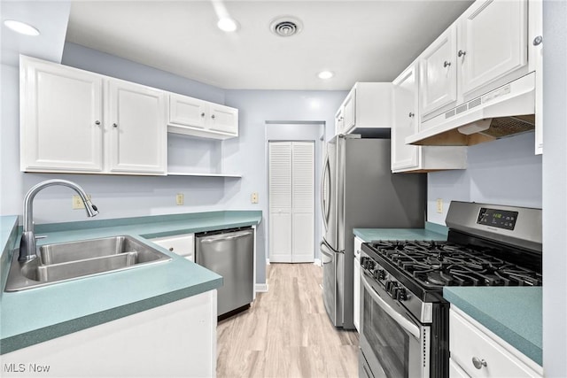 6465 Saint Andrews Dr Unit 6, Canfield, OH 44406 - kitchen featuring appliances with stainless steel finishes, under cabinet range hood, a sink, white cabinets, and recessed lighting