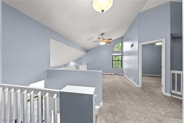6465 Saint Andrews Dr Unit 6, Canfield, OH 44406 - hall featuring carpet flooring, an upstairs landing, baseboards, and high vaulted ceiling