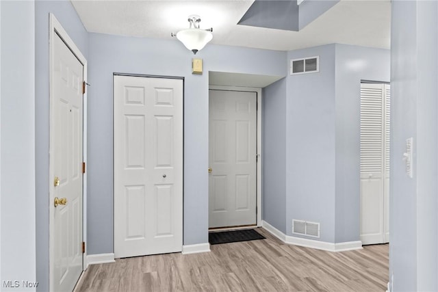 6465 Saint Andrews Dr Unit 6, Canfield, OH 44406 - foyer entrance featuring light wood finished floors and baseboards
