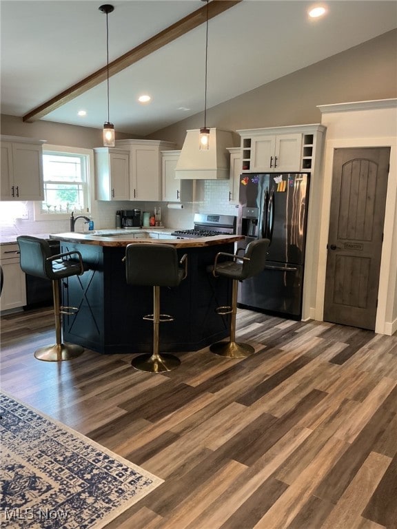 7030 Jones Rd, Nashport, OH 43830 - kitchen featuring black fridge with ice dispenser, premium range hood, lofted ceiling, open shelves, and tasteful backsplash