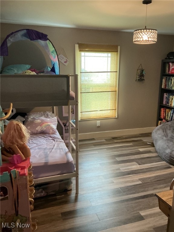 7030 Jones Rd, Nashport, OH 43830 - bedroom with wood finished floors and baseboards