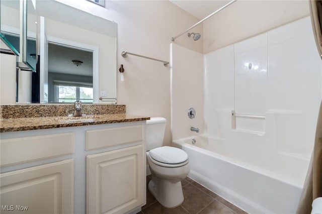 3128 E 135th St Unit 4, Cleveland, OH 44120 - full bathroom featuring toilet, vanity, washtub / shower combination, and tile patterned floors