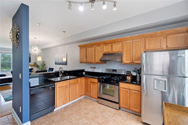 3128 E 135th St Unit 4, Cleveland, OH 44120 - kitchen with stainless steel appliances, under cabinet range hood, a sink, light tile patterned floors, and decorative light fixtures