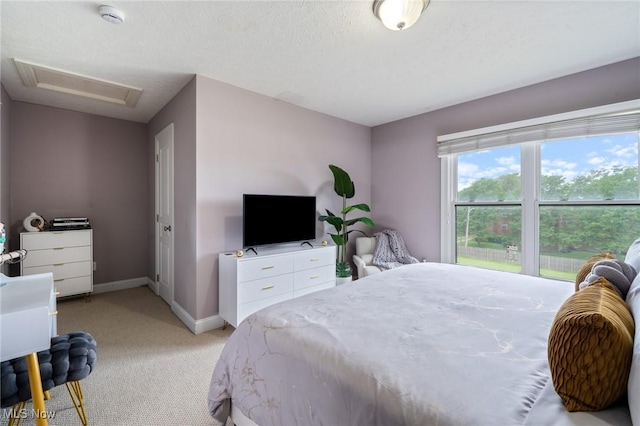 3128 E 135th St Unit 4, Cleveland, OH 44120 - bedroom featuring attic access, light colored carpet, and baseboards