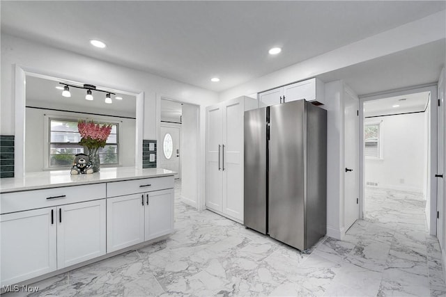 2330 Traymore Rd, University Heights, OH 44118 - kitchen with freestanding refrigerator, light marble finish floors, white cabinets, light countertops, and recessed lighting