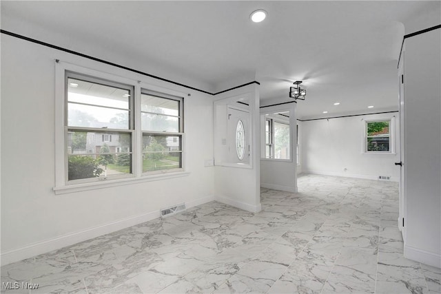2330 Traymore Rd, University Heights, OH 44118 - spare room featuring baseboards, light marble finish floors, and recessed lighting