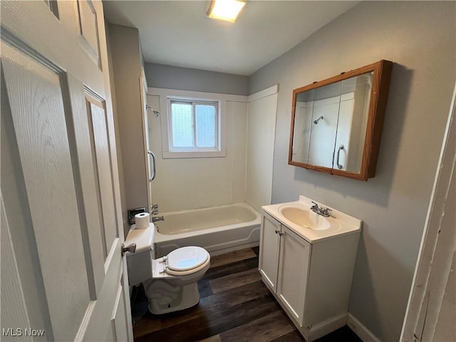 1705 Etruria St, East Liverpool, OH 43920 - bathroom featuring toilet, vanity, wood finished floors, and tub / shower combination