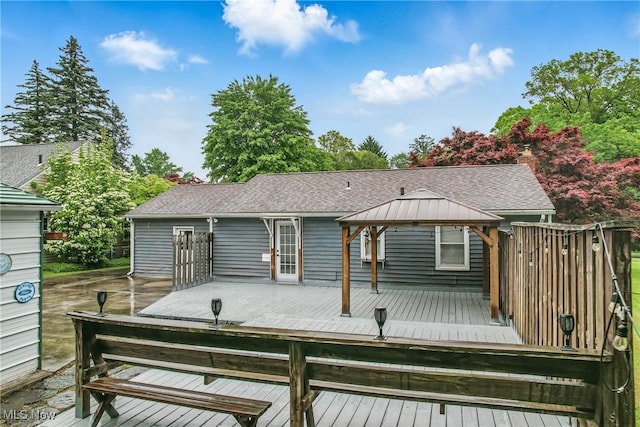 2506 Bears Den Rd, Youngstown, OH 44511 - rear view of property featuring a gazebo, a shingled roof, and a wooden deck