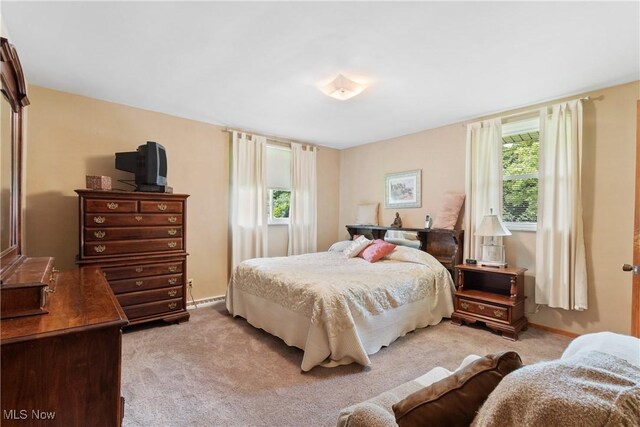 4937 Stevens Rd, Akron, OH 44319 - bedroom with carpet floors and baseboards
