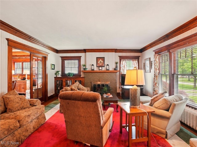 126 W Jefferson St, Jefferson, OH 44047 - living room featuring ornamental molding and wood finished floors