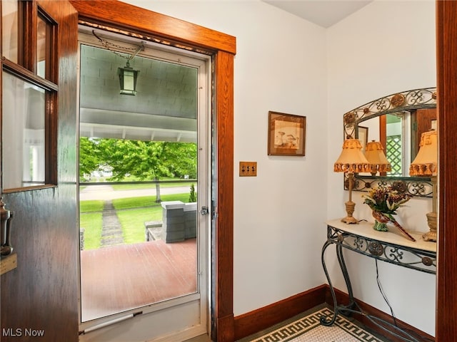126 W Jefferson St, Jefferson, OH 44047 - doorway featuring baseboards