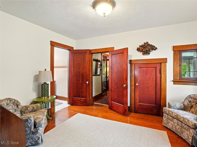 126 W Jefferson St, Jefferson, OH 44047 - living area with wood finished floors