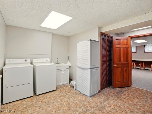 126 W Jefferson St, Jefferson, OH 44047 - washroom with cabinet space, independent washer and dryer, baseboard heating, and light floors