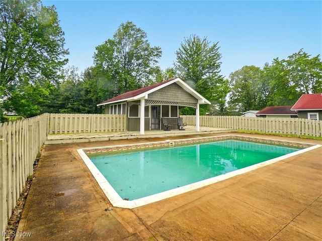 126 W Jefferson St, Jefferson, OH 44047 - view of pool with a patio, a fenced backyard, an outbuilding, and an exterior structure