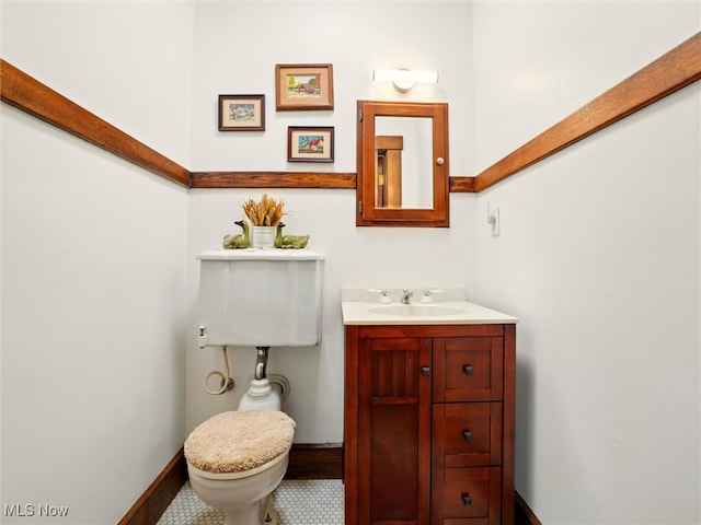 126 W Jefferson St, Jefferson, OH 44047 - half bath featuring vanity, toilet, and baseboards