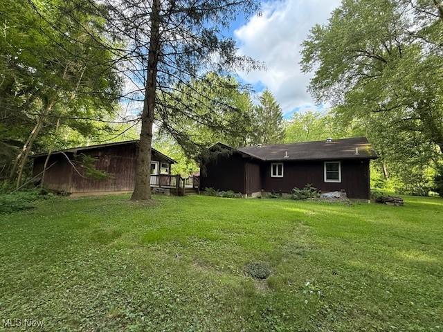 4784 Bate St, Newton Falls, OH 44444 - rear view of house with a yard