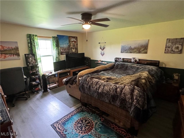 71322 Sharon Rd, Bridgeport, OH 43912 - bedroom with wood finished floors and a ceiling fan