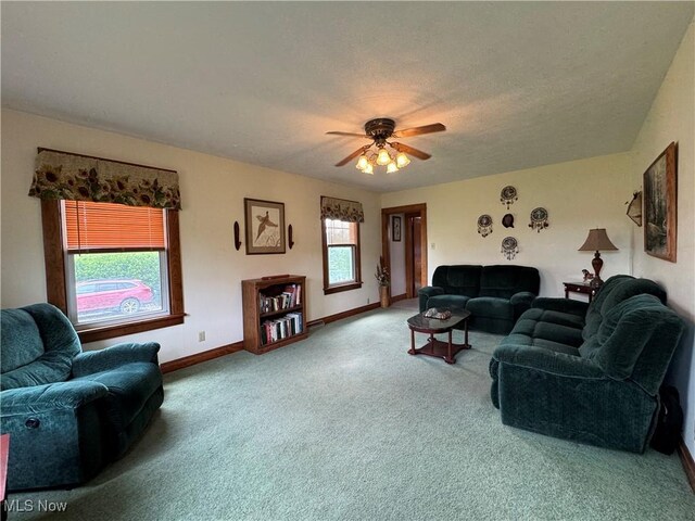 71322 Sharon Rd, Bridgeport, OH 43912 - carpeted living room with baseboards and ceiling fan
